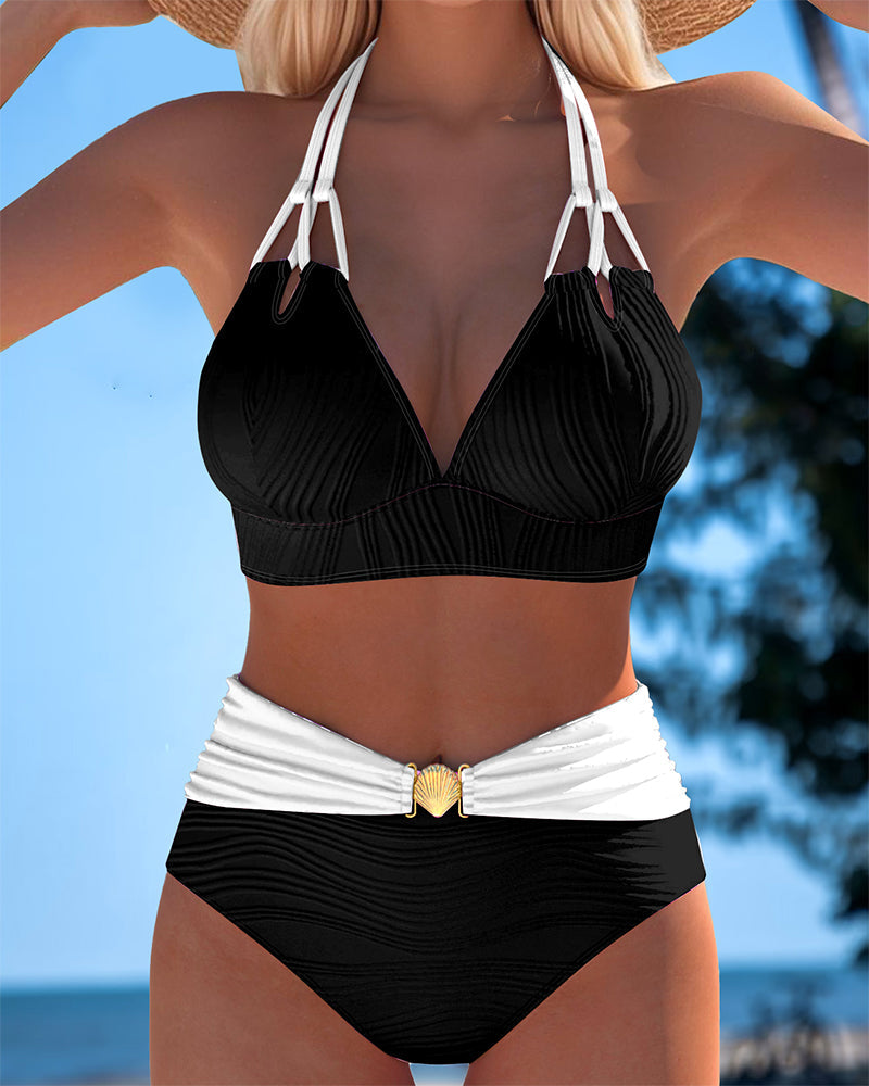 Women’s high-waisted double strap swimsuit, black top with white contrast, striped fabric