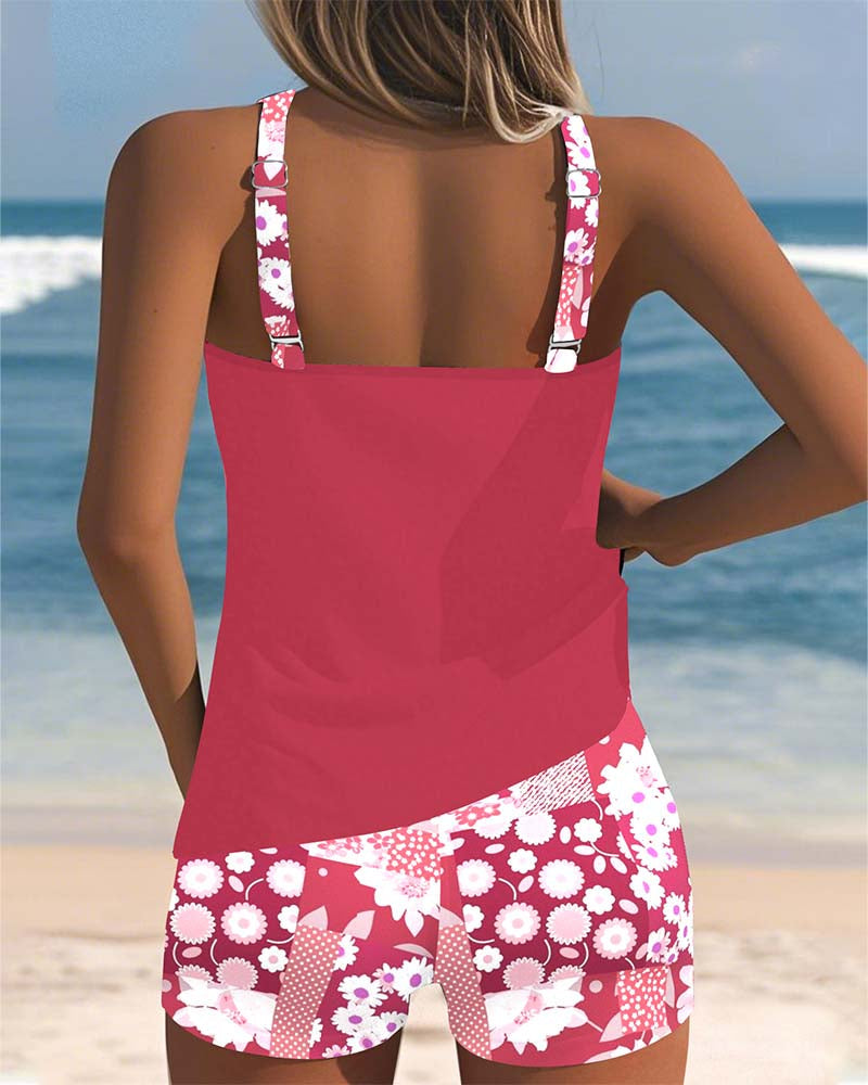 Belly-covering swim set, pink racerback tank and pink-and-white floral patterned swim shorts, back view
