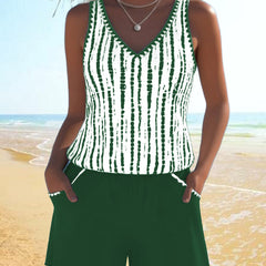 Green two-piece V-neck swimsuit set with white vertical tie-dye stripe tank and shorts