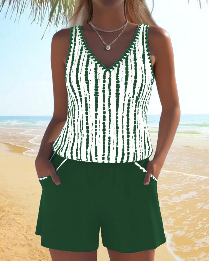 Green two-piece V-neck swimsuit set with white vertical tie-dye stripe tank and shorts