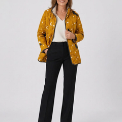 Quilted cat-themed Halloween jacket, mustard orange with star and cat print, zip front