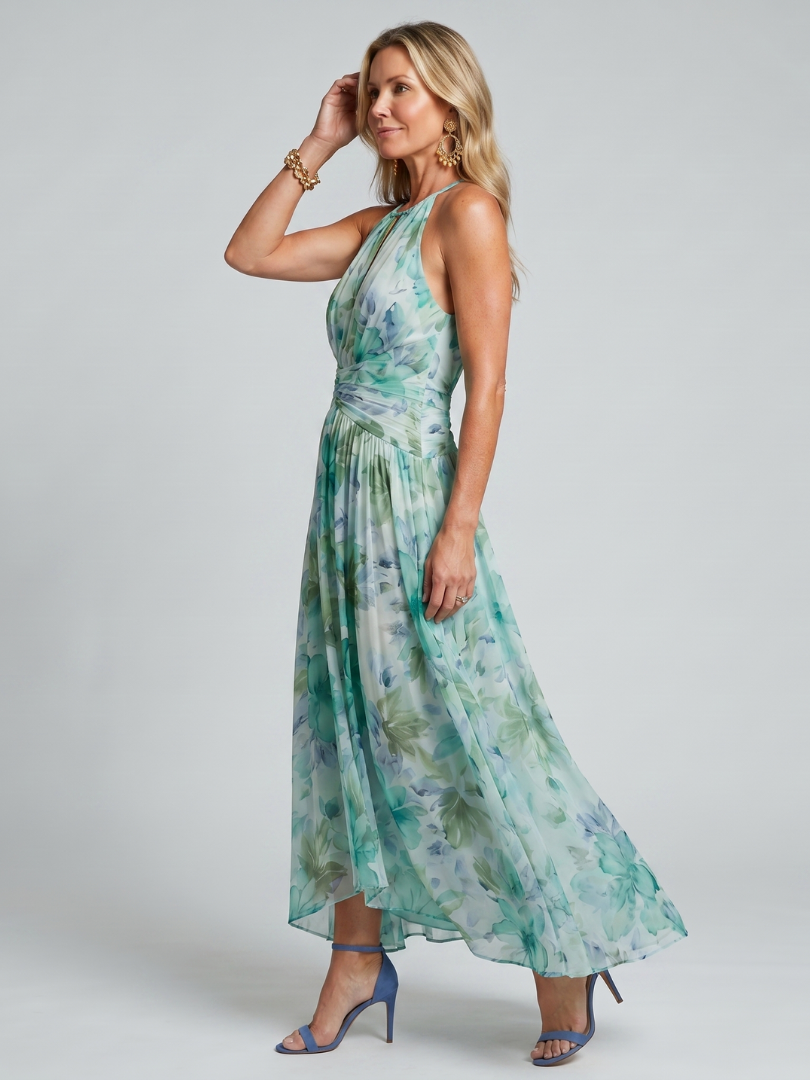 Green floral halter midi dress with keyhole neckline detail and flowing pleats