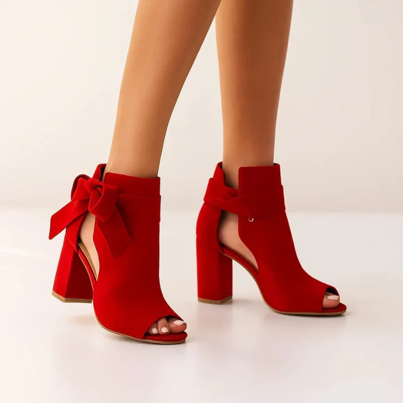 Red heeled peep-toe sandals with ankle bow and chunky block heel