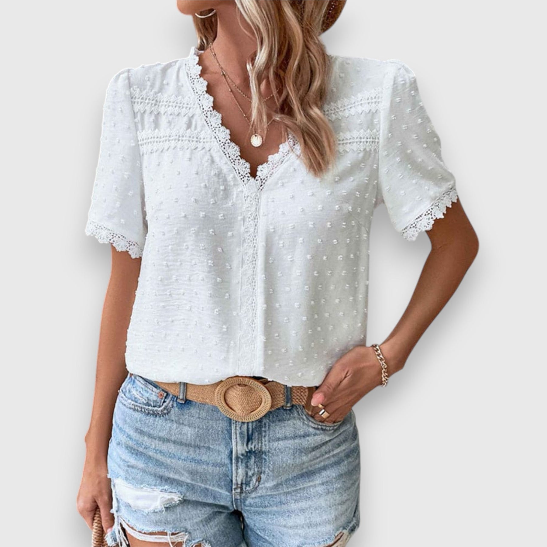Wassa white short-sleeve button-up shirt with lace-trim collar and small dot texture