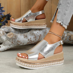 Silver metallic platform sandals with ankle strap and espadrille-style sole