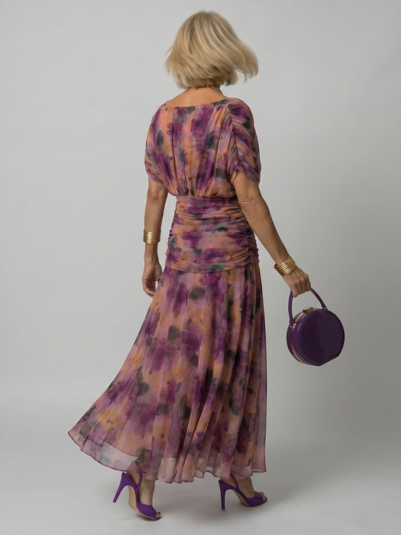 Off-shoulder maxi dress in purple floral print, gathered back and flowing skirt