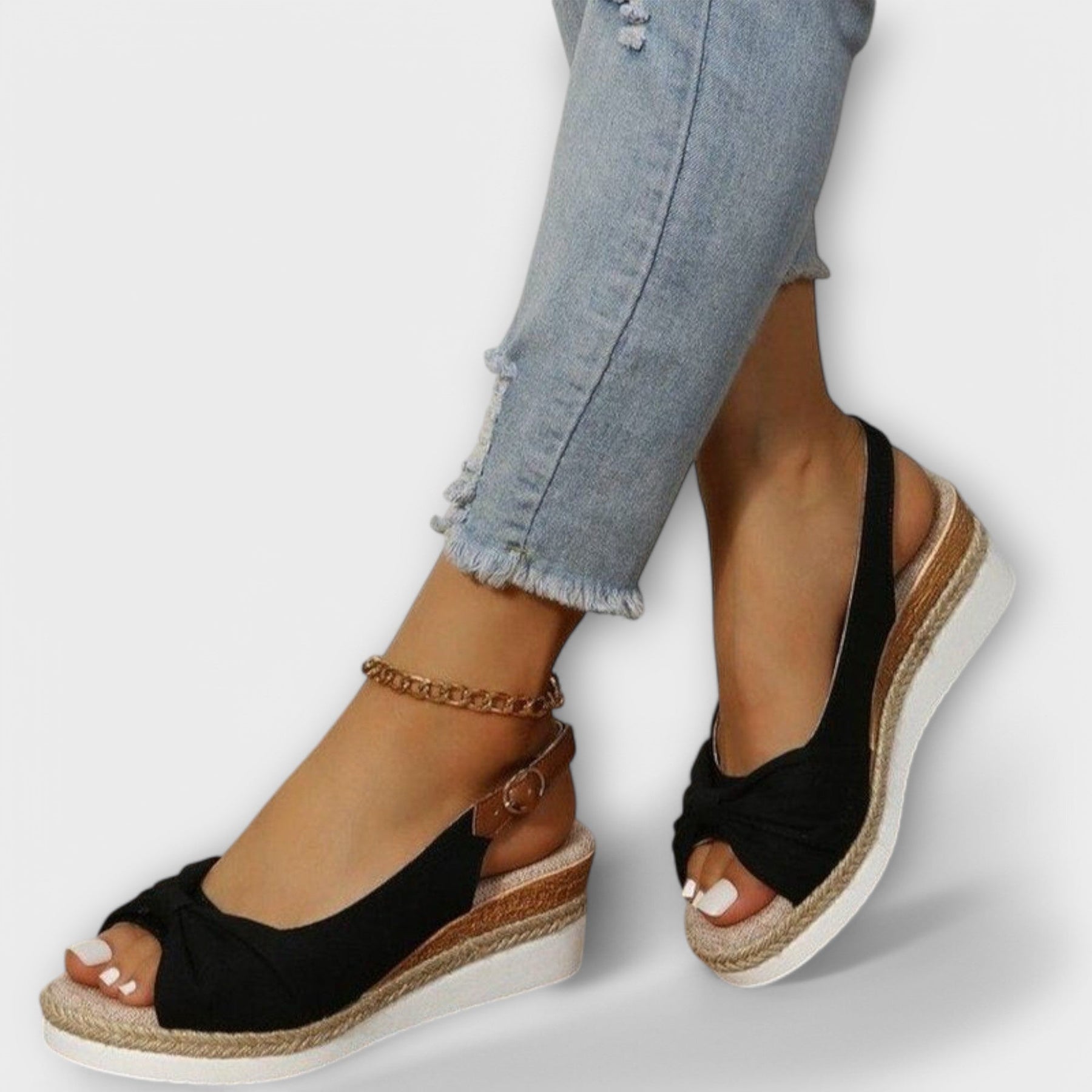 Black espadrille wedge sandals with bow front and open toe