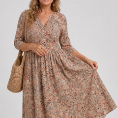 Beige floral midi dress with V-neck, three-quarter sleeves, and flowing skirt