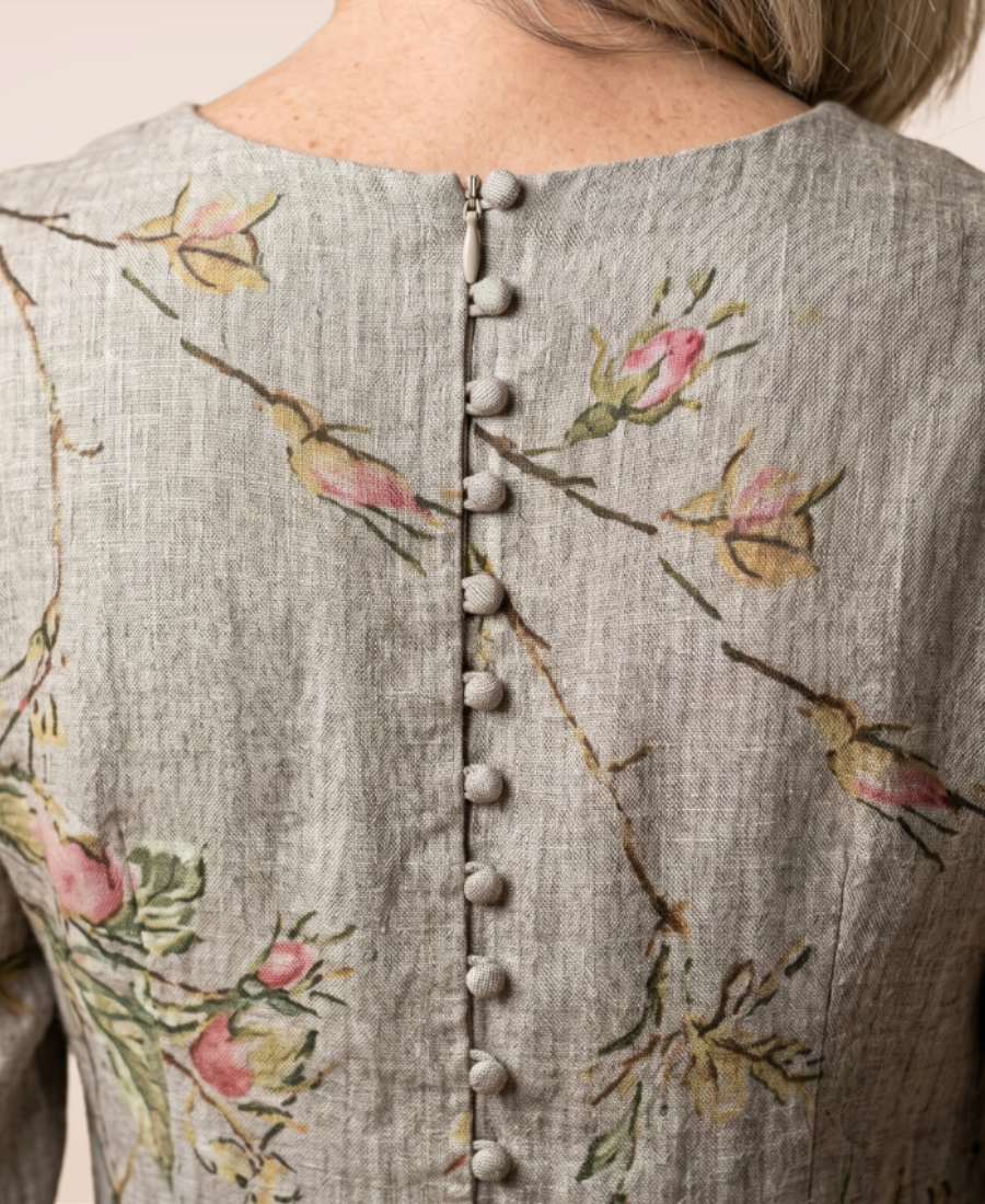 Floral relaxed dress back view with V-neck, button placket, and multicolor branch print