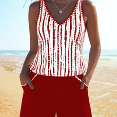 Red two-piece V-neck swimsuit set with white vertical tie-dye stripe tank and shorts