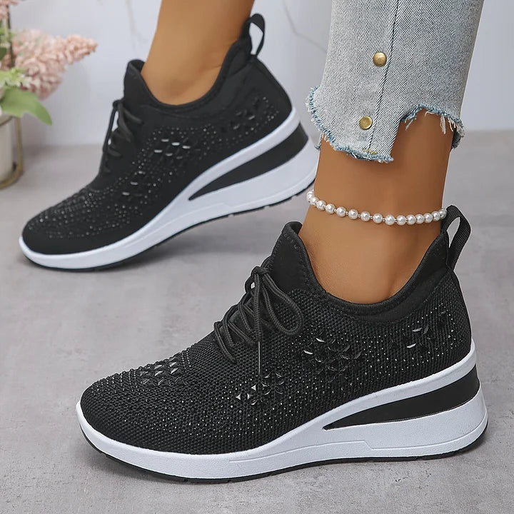 Black knit lace-up sneakers with rhinestone pattern and white-and-black platform sole