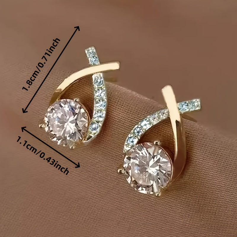Pair of gold-tone stud earrings with teardrop hoops and round crystal stones