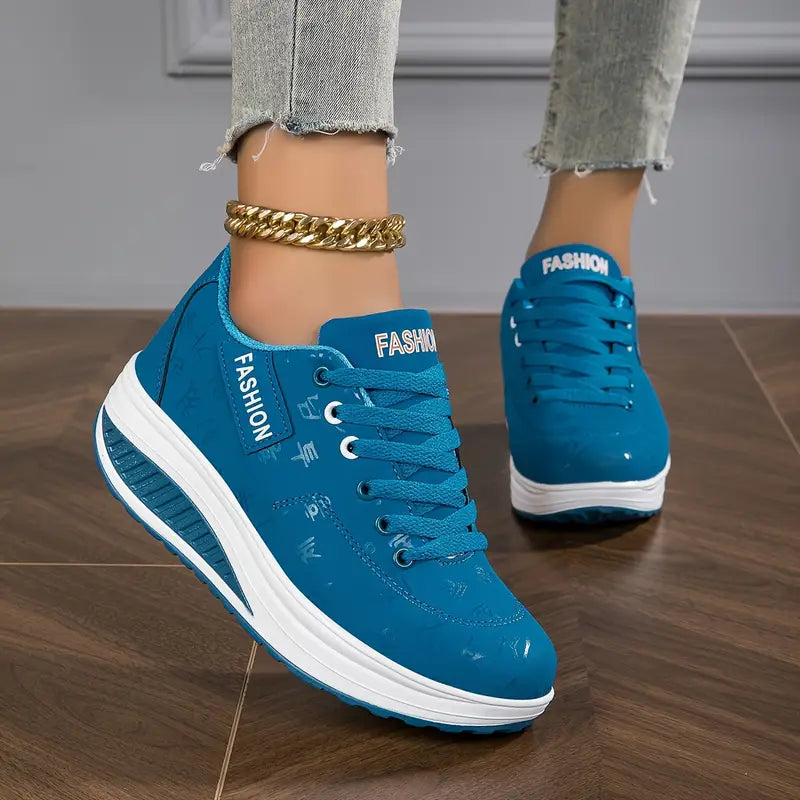 Blue platform comfort sneakers with white sidewall trim and lace-up front