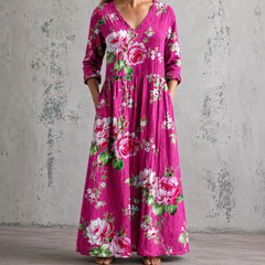 Magenta floral maxi dress with V-neck, rose print, and 3/4 sleeves