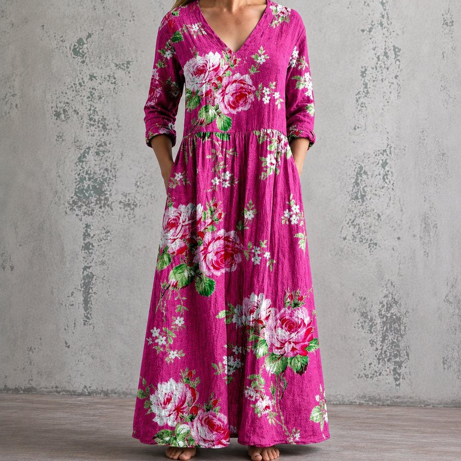 Magenta floral maxi dress with V-neck, rose print, and 3/4 sleeves