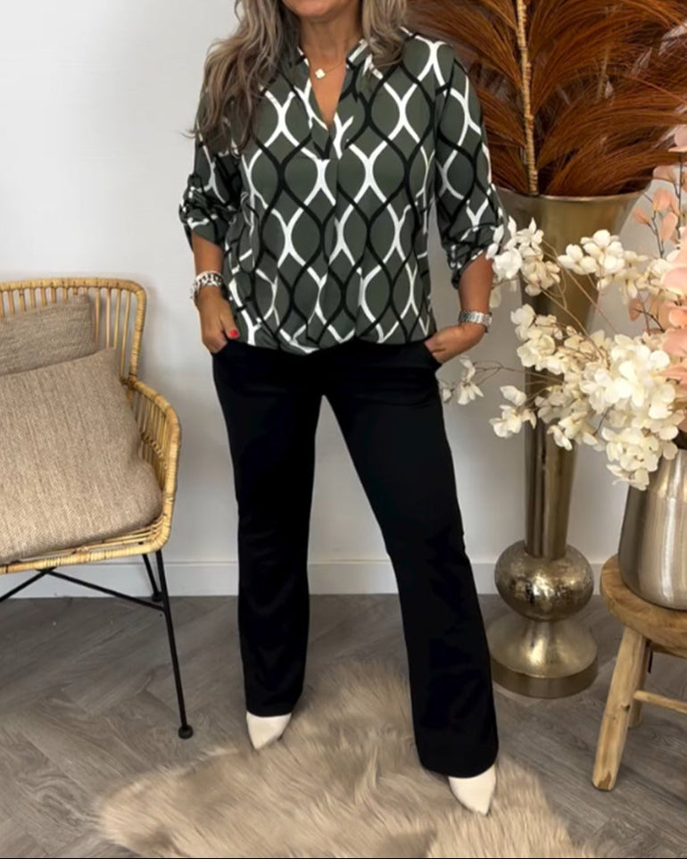 Olive green casual long-sleeve blouse with white linked oval pattern and relaxed fit