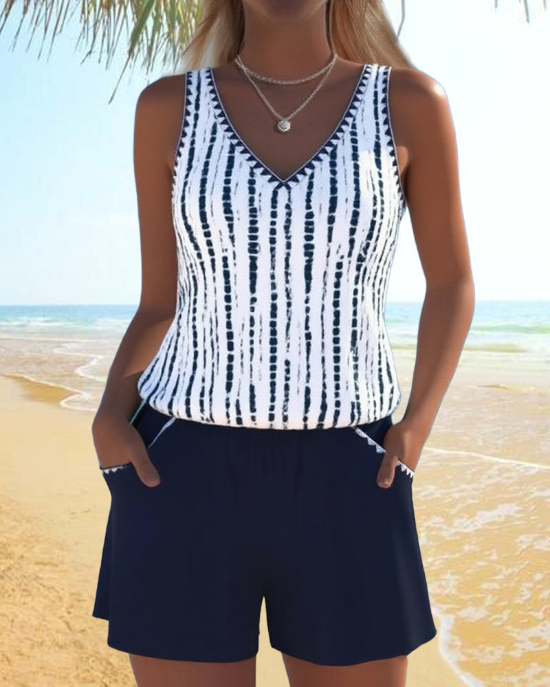Navy two-piece V-neck swimsuit set with sleeveless stripe tank and matching shorts