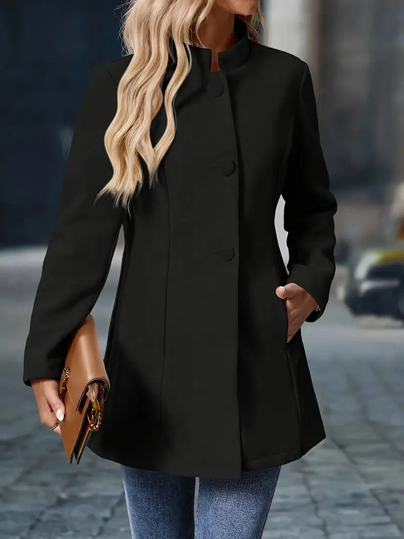Black single-breasted tailored coat with rounded buttons, notch lapels, and pockets