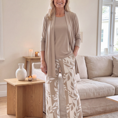 Beige three-piece casual set: draped cardigan, knit top, leaf-print wide-leg pants