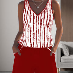 Red two-piece V-neck swimsuit set with white vertical tie-dye stripe tank and shorts