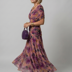 Off-shoulder flow maxi dress in purple multicolor print, gathered waist and flowing skirt