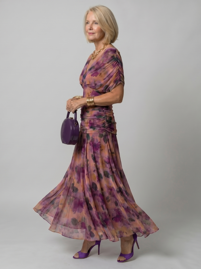 Off-shoulder flow maxi dress in purple multicolor print, gathered waist and flowing skirt