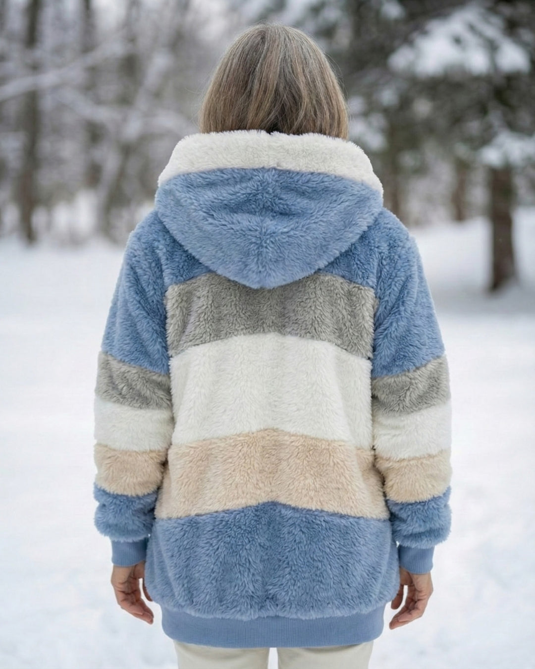 Back view of colorblock plush zip-up hoodie jacket, blue, cream, and tan stripe panels