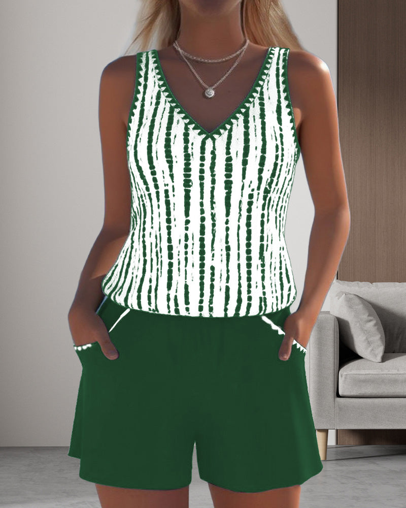 Two-piece printed v-neck swimsuit set: green striped top with matching green shorts