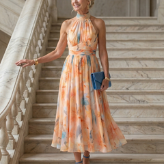 Watercolor orange-and-blue halter midi dress with tie-neck, gathered bodice, A-line skirt