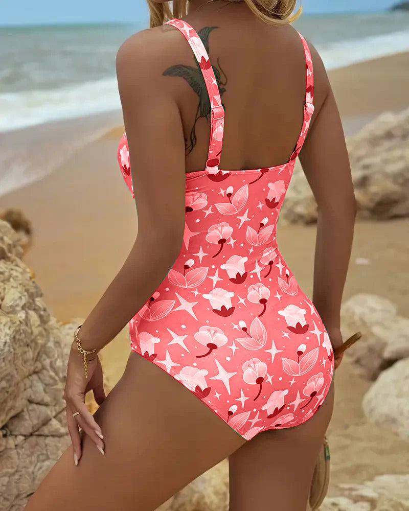 Printed one-piece tankini swimsuit in red-pink with thin tank straps, back view