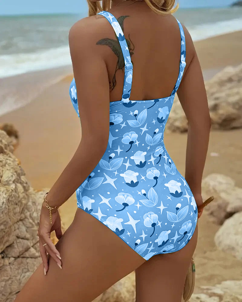 Blue printed one-piece tankini swimsuit with thin tank straps, back view