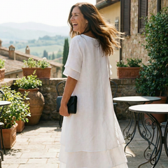 White soft layered midi dress with short sleeves and tiered skirt