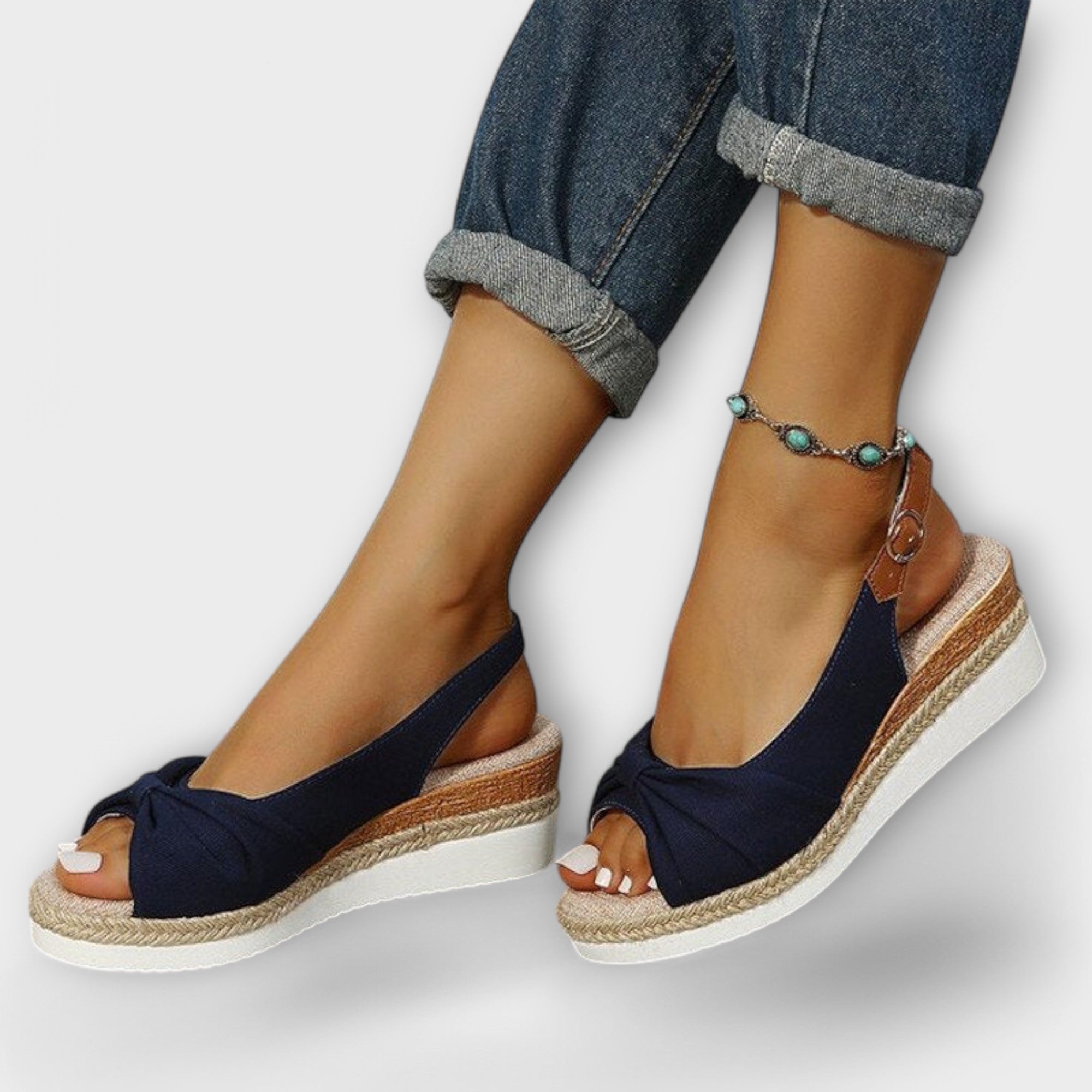 Navy espadrille wedge sandals with ankle strap and bow front