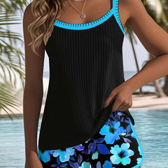 Two-piece tankini set, black scoop-neck tank and blue floral shorts, turquoise trim.