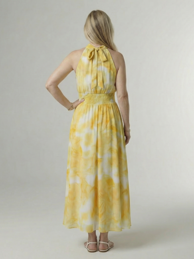 Yellow gathered halter midi dress, back view, tie-neck with gathered waist