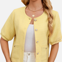 Cropped yellow tweed blazer jacket with short sleeves, gold-tone buttons, chest pocket