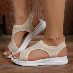 Beige knit open-toe sandals with ankle strap and white cushioned sole