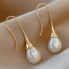Gold-tone teardrop hook earrings with white pearl dangle