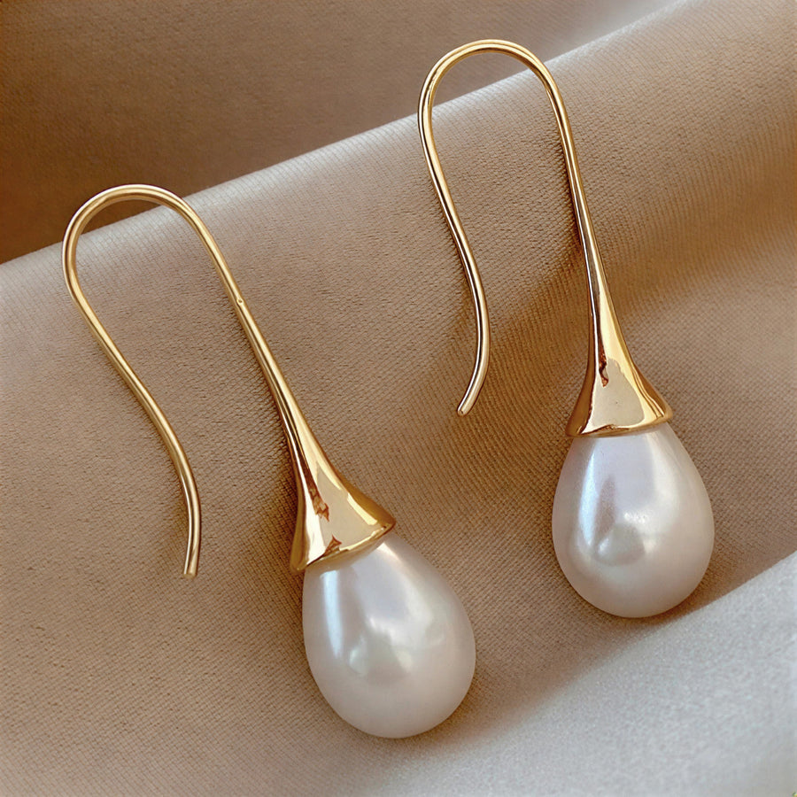 Gold-tone teardrop hook earrings with white pearl dangle