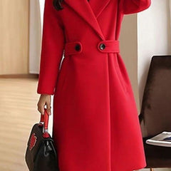 Bright red long overcoat with notched lapels, double buttons, and waist belt