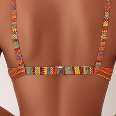 Back view of orange striped bikini top with racerback straps and metal center clasp