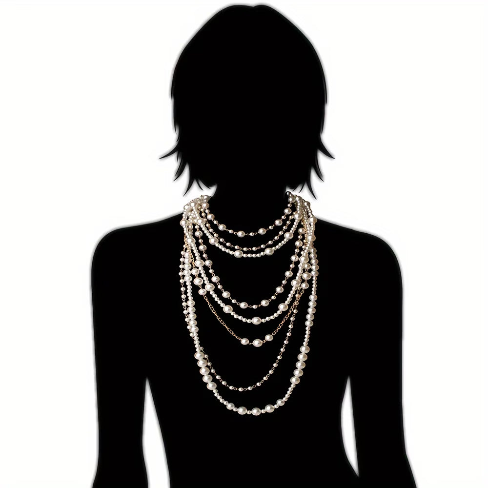 Pearl multi-layer statement necklace on mannequin back with layered strands