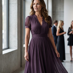 Purple keyhole maxi dress with puff sleeves and gathered waist, pleated full skirt