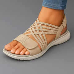 Beige woven strappy sandals with crisscross upper and cushioned sole