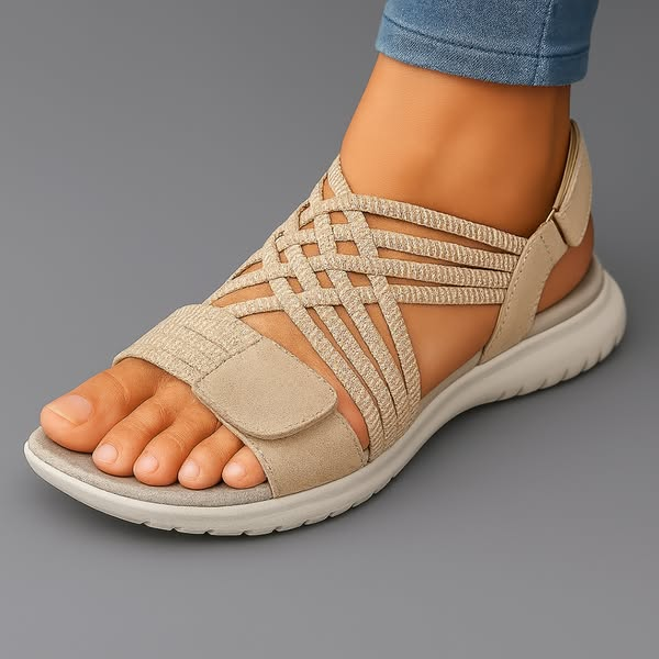 Beige woven strappy sandals with crisscross upper and cushioned sole