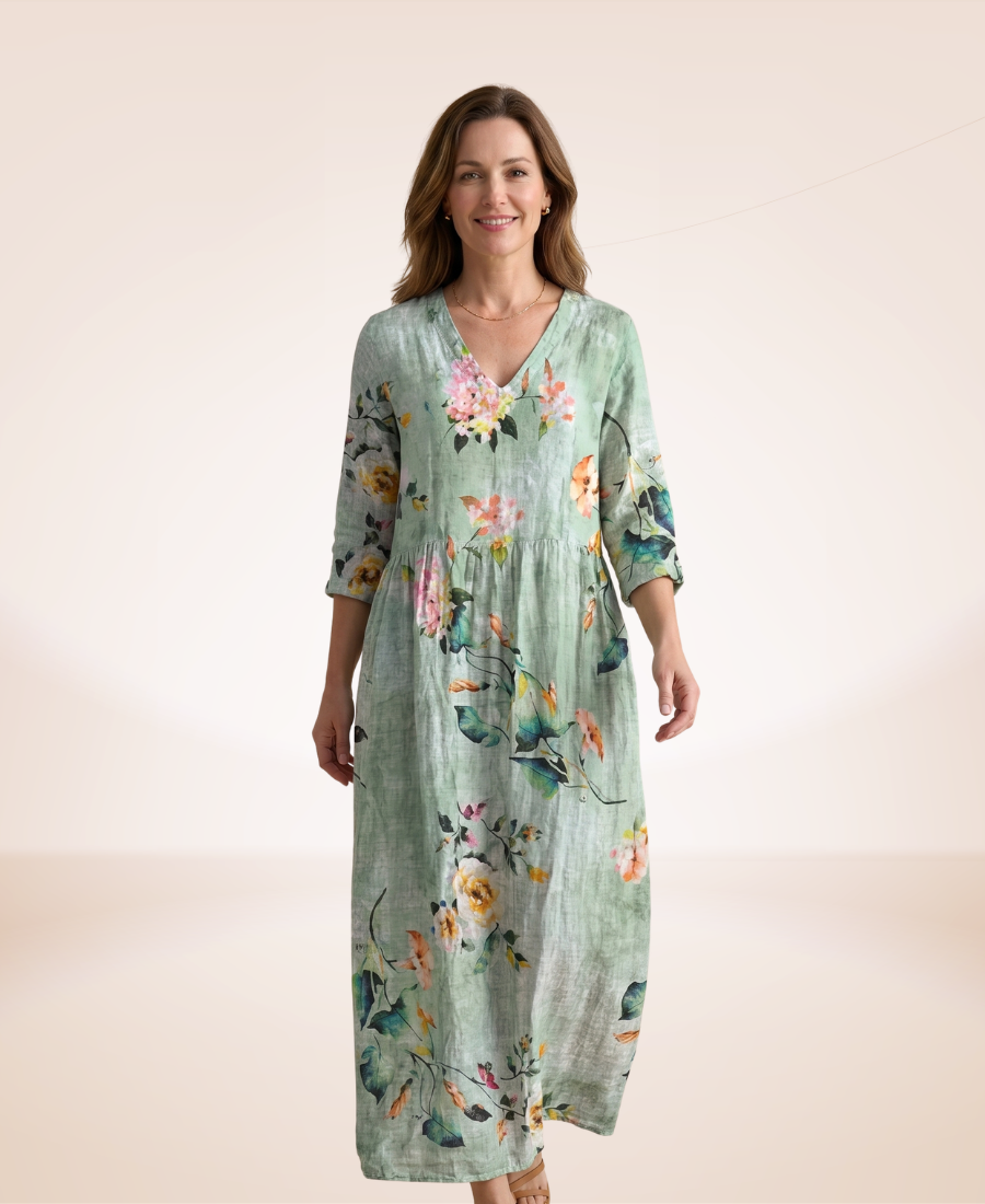 Floral relaxed dress in mint green with colorful bouquets, V-neck, 3/4 sleeves, midi length