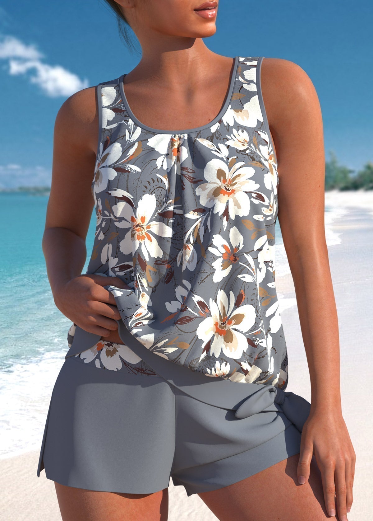Grey tankini set with white and orange floral print and matching swim shorts