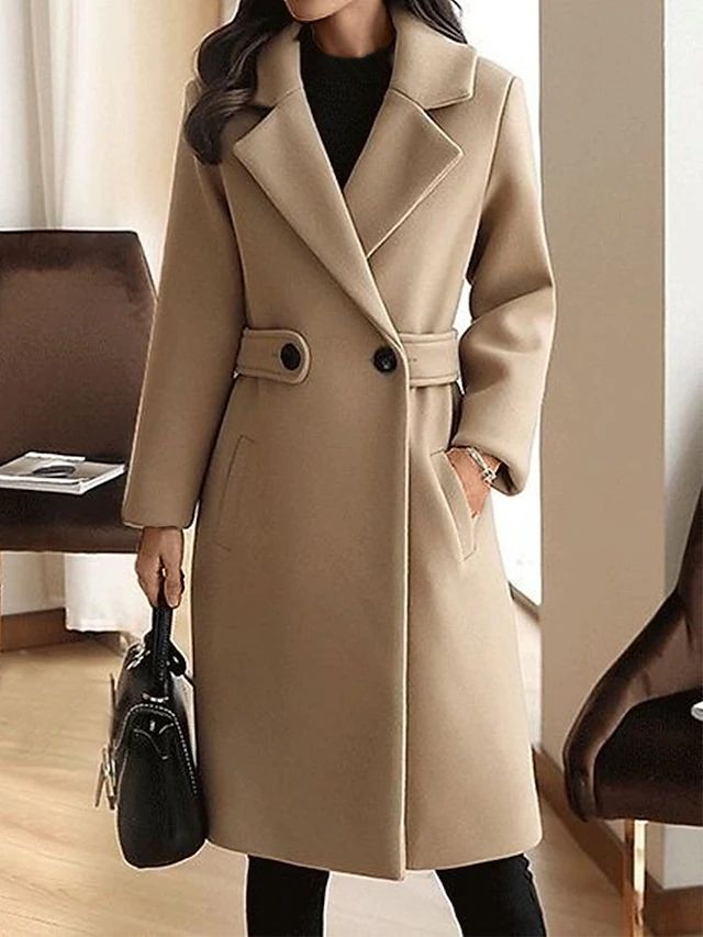 Camel beige long overcoat with notched lapels, front buttons, and tied waist belt