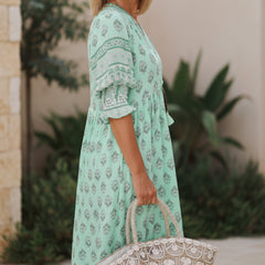 Mint green printed half-sleeve V-neck dress with gathered waist
