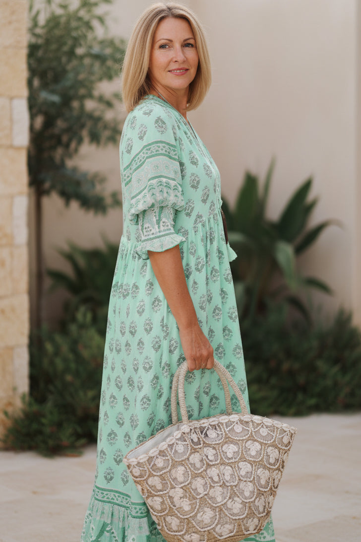 Mint green printed half-sleeve V-neck dress with gathered waist
